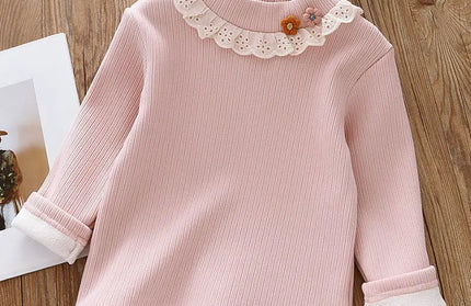 Fleece-lined turtleneck with ruffle